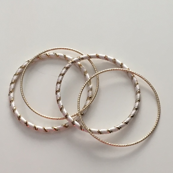 White and Gold set of 4 bracelets 👌🏻💘 - Picture 2 of 3